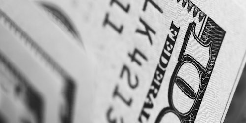 Person making a secure online payment on a laptop